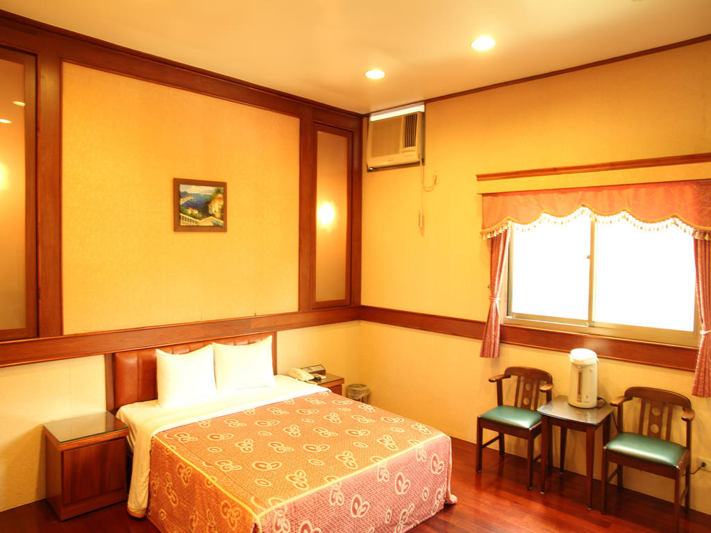 Fukun 5 Motel Jiaoxi Quarto foto